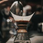 shallow focus photography of black and brown coffeemaker